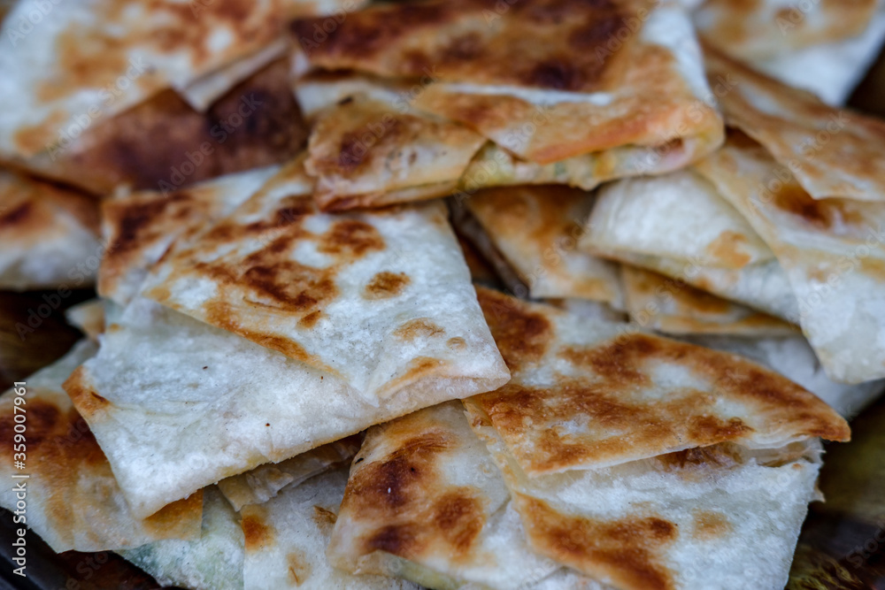 Appetizer for beer with thin pita bread stuffed with barbecue. Appetizer for beer with thin pita bread stuffed with barbecue.