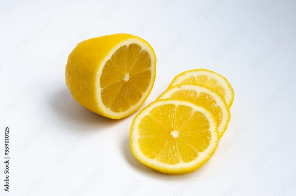 Sliced lemon, lemon slices, lemon close up background. Sliced lemon, lemon slices, lemon close up background.