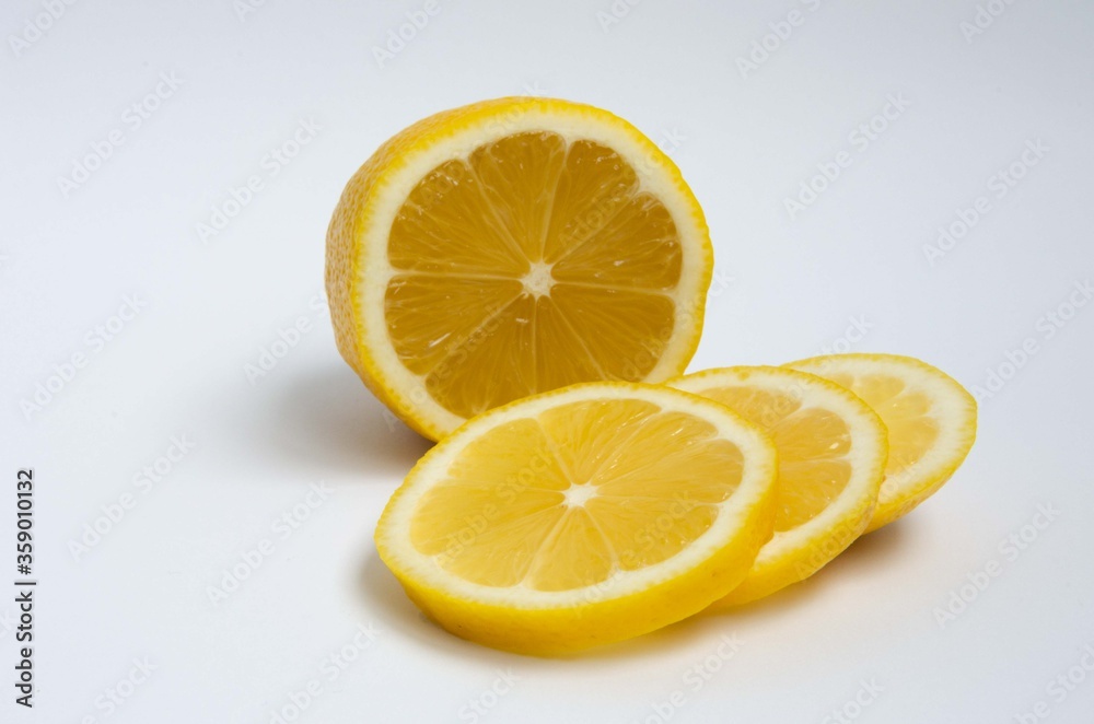 Sliced lemon, lemon slices, lemon close up background.