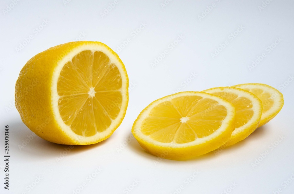 Sliced lemon, lemon slices, lemon close up background. Sliced lemon, lemon slices, lemon close up background.