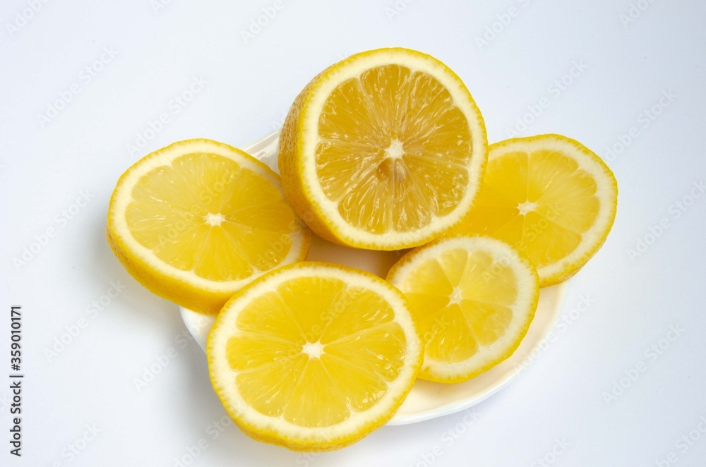 Sliced lemon, lemon slices, lemon close up background. Sliced lemon, lemon slices, lemon close up background.
