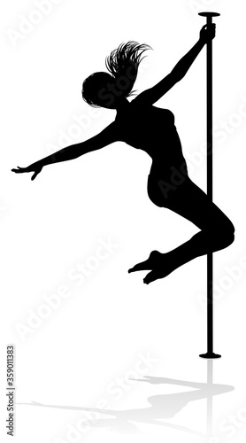 A woman pole dancer exercising for fitness in silhouette
