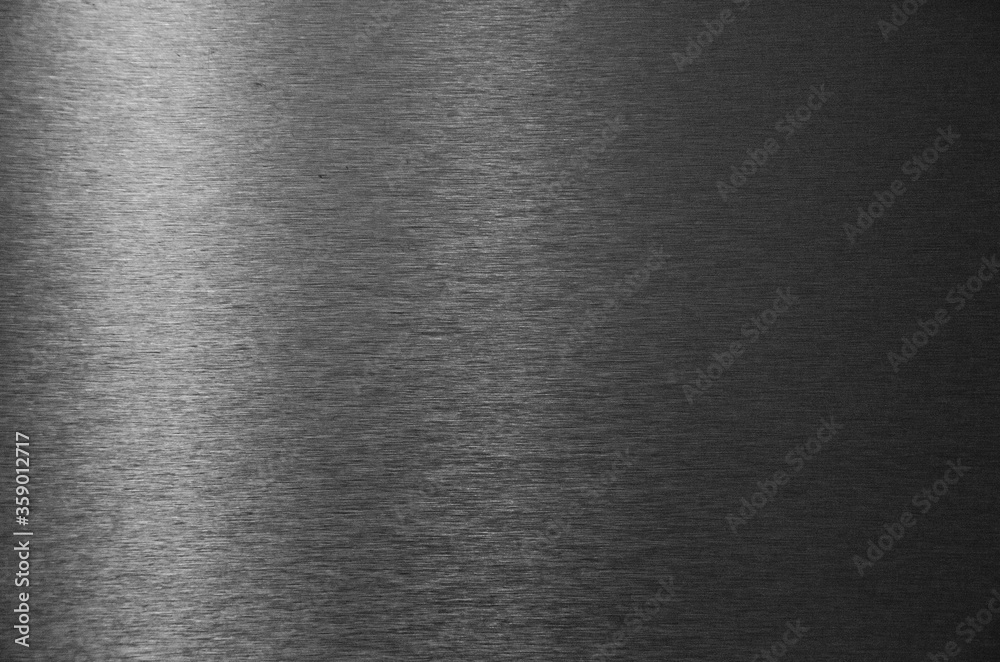 Texture of polished gray pure metal, polished metal sheet background. Texture of polished gray pure metal, polished metal sheet background.
