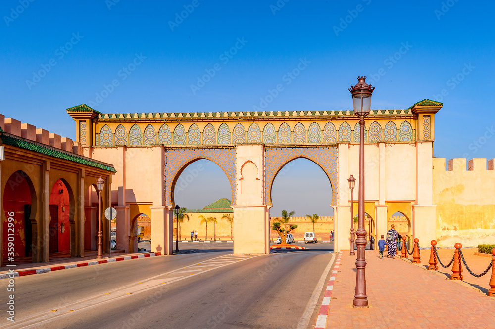 It's Bab Mansour Gate and El Hedime Place in Meknes, a city in Morocco which was founded in the 11th century by the Almoravids as a military settlement