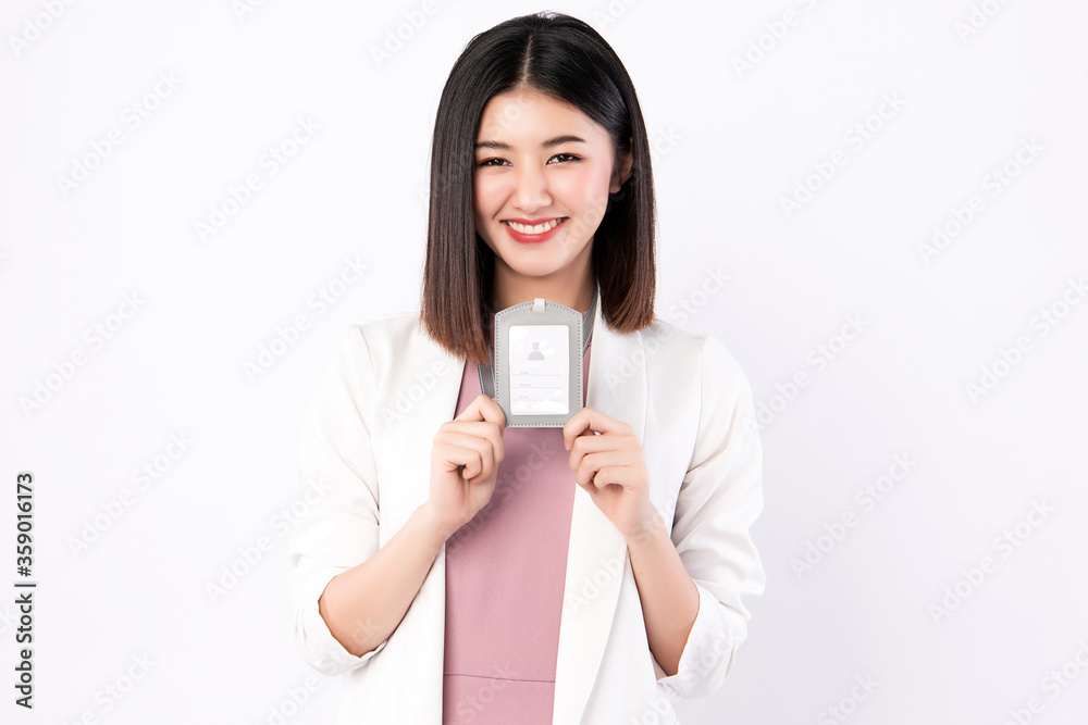 Working Woman with business attire showing her badge Working Woman with business attire showing her badge