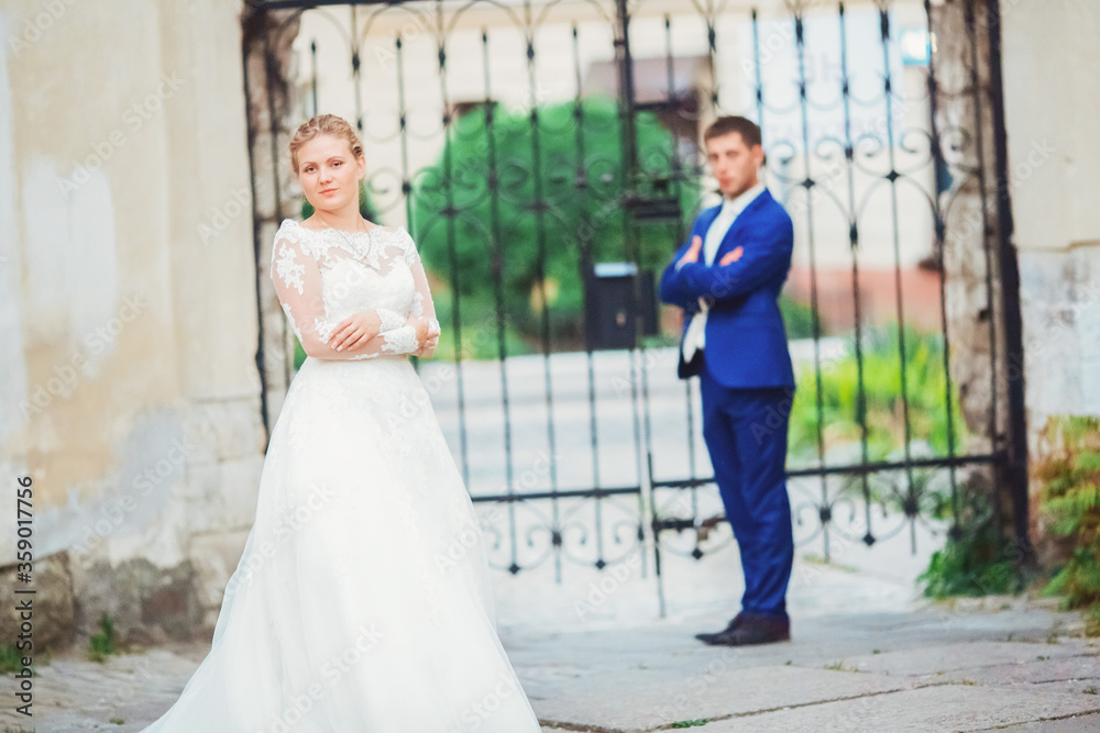 Fototapeta premium happy young couple walking around the city