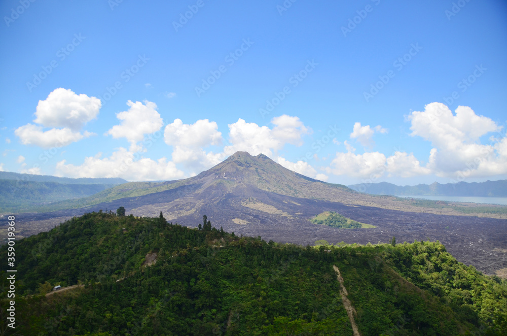 Mount Batur (or The Kintamani Volcano) is an active volcano and a very popular trek. The captivating Mount Batur surrounds the 13-sq-km Batur caldera lake. Mount Batur (or The Kintamani Volcano) is an active volcano and a very popular trek. The captivating Mount Batur surrounds the 13-sq-km Batur caldera lake.