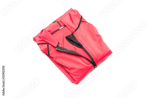 Folded red zipper windbreaker jacket, UV sun proof outdoor jacket hoodie. Track jacket sport hoodie full zip isolated on white background. Folded clothes.