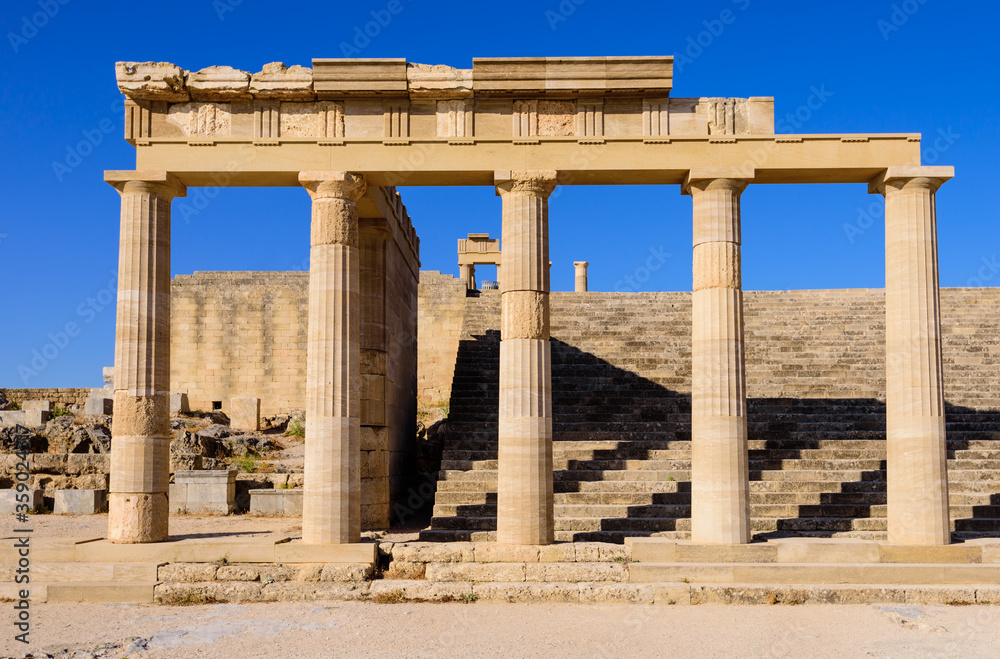 Fototapeta premium Sightseeing of Rhodes island. Ruins of ancient temple in Lindos, Rhodes island, Greece.