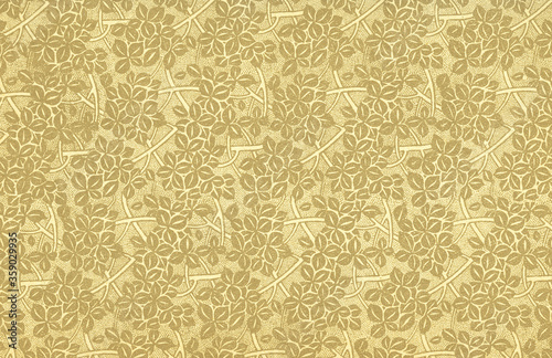 Used vintage wallpaper with leaves and branches in beige - circa 1906 - natural grainy surface