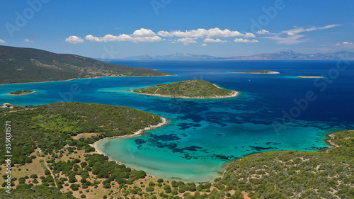 Aerial drone photo of beautiful paradise island turquoise sandy beach in Chersonisi in complex of Petalioi that form a blue lagoon in South Evoia island near Marmari, Greece © aerial-drone