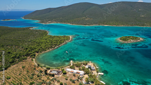 Aerial drone photo of beautiful paradise island complex in gulf of of Petalioi or Petalion that form a blue lagoon with sandy turquoise beaches, South Evoia island near Marmari, Greece © aerial-drone