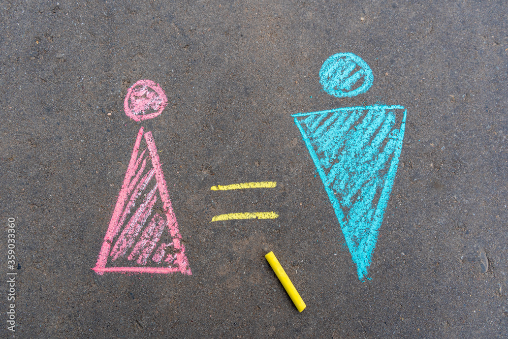 Φωτογραφία The concept of gender equality, the pictogram of men and women and the equal sig