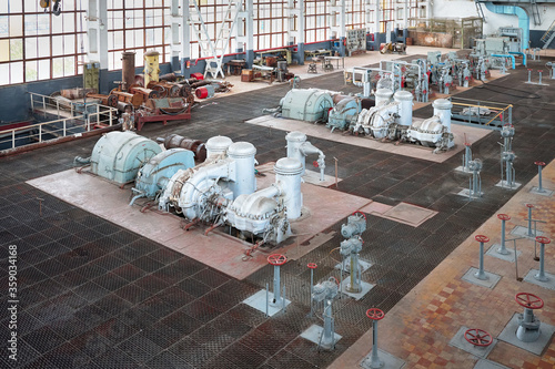 GRODNO, BELARUS - MAY 2020: Example of chemical industrial interior. Compression machinery department . Two high pressure nitrogen turbine compressors of nitrogen fire extinguishing system.