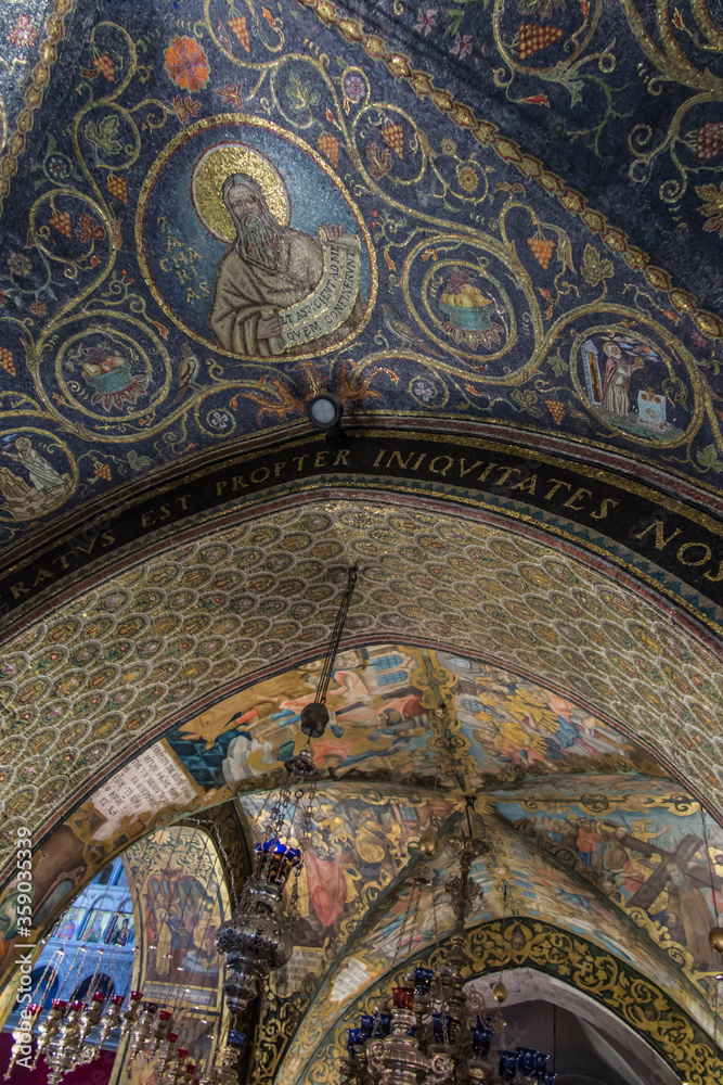 JERUSALEM ISRAEL, January 29, 2020: Golgotha, the place of Jesus' crucifixion within the Basilica of the Holy Sepulcher. Colorful mosaics on the walls and ceiling. Jerusalem