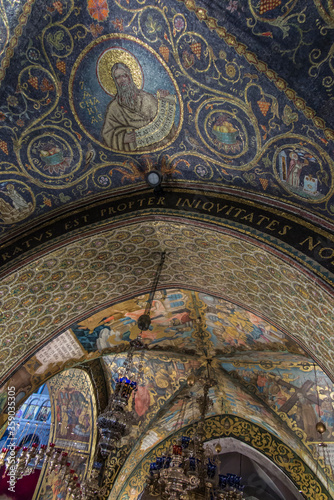 JERUSALEM ISRAEL, January 29, 2020: Golgotha, the place of Jesus' crucifixion within the Basilica of the Holy Sepulcher. Colorful mosaics on the walls and ceiling. Jerusalem
