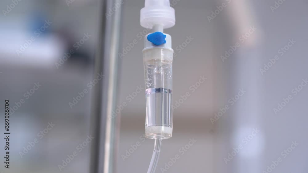 drops of medicine in a dropper close-up for the patient's deep sleep during dental implantation drops of medicine in a dropper close-up for the patient's deep sleep during dental implantation