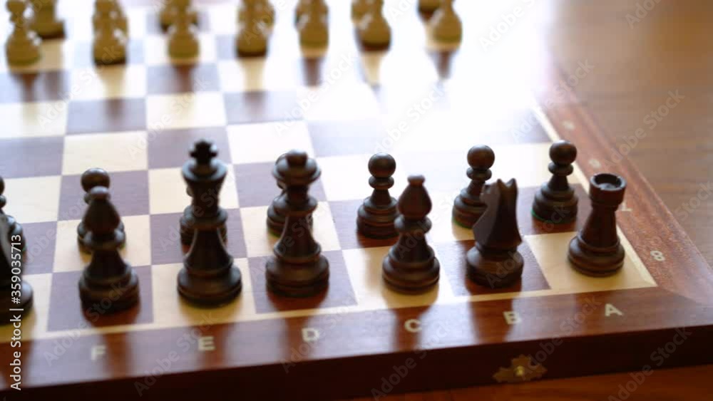 Chess pieces are placed on the chessboard, the beginning of the chess game. Chess placed on a chessboard. Chess pieces are placed on the chessboard, the beginning of the chess game. Chess placed on a chessboard.