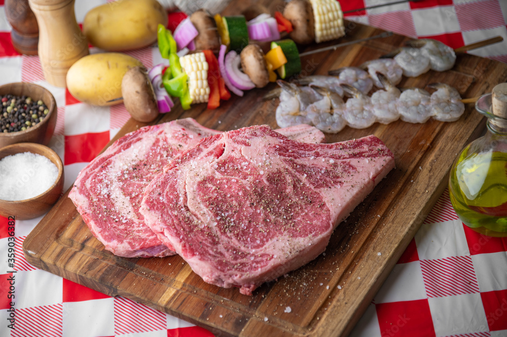 fresh ribeye steak with skewered shrimp and vegetable fresh ribeye steak with skewered shrimp and vegetable