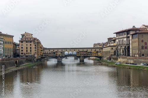 Ponte Vecchio the famous Arch bridge in Florence on Arno river, Tuscany, Italy © marcodotto