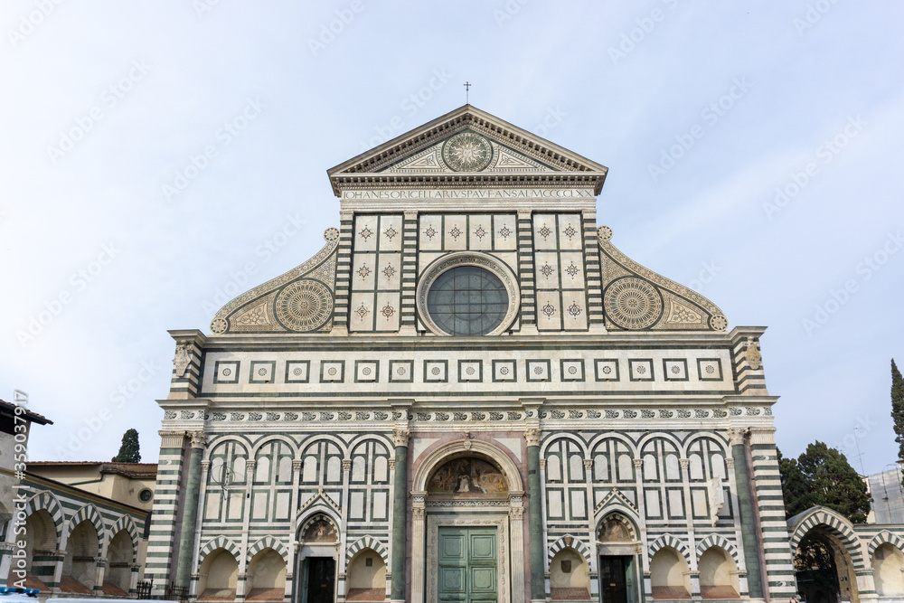 Florence, Italy - March 2, 2019: Italian monument Santa Maria Novella church. Renaissance and gothic architecture tourist attraction near train station.