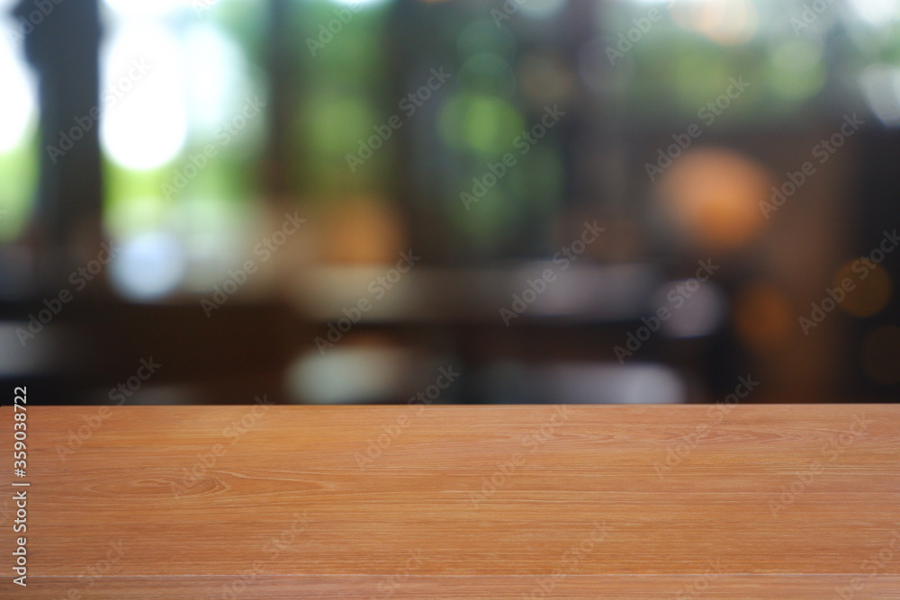 Empty wooden table in front of abstract blurred Cafe, restaurant, house interior. For montage product display or design key visual layout - Image Empty wooden table in front of abstract blurred Cafe, restaurant, house interior. For montage product display or design key visual layout - Image