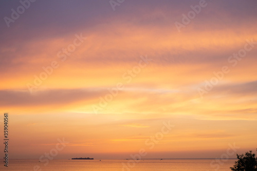 sunset over the sea and clouds