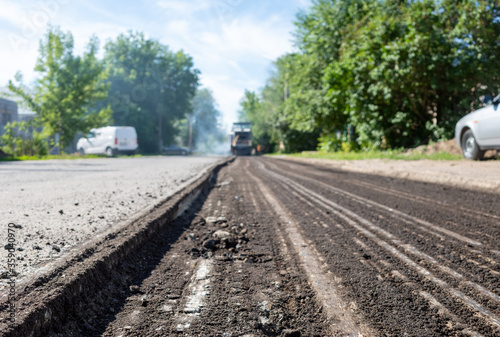 Road repair. Replacing the roadway. Change old asphalt road.