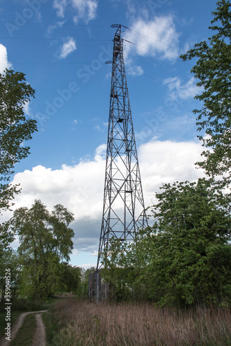 high voltage electric traction pole built on a solid foundation in Bydgoszcz, near the Vistula River