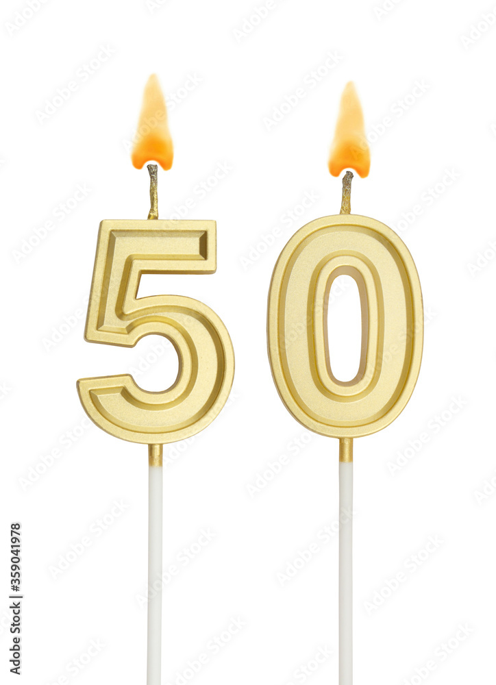Burning golden birthday candles isolated on white background, number 50 Burning golden birthday candles isolated on white background, number 50