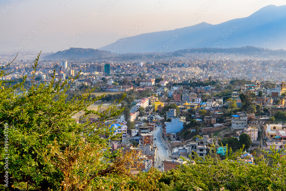 View of Katmandu from the Swayambhunath , an ancient religious architecture atop a hill