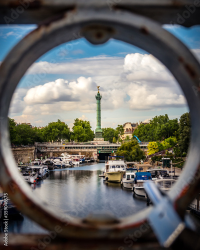 Paris, France Bastille column view from canal saint-Martin Inside geometric shapes