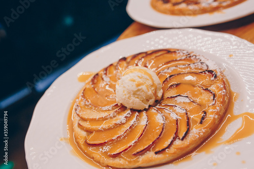 Eat sweet dessert cuisine tart Pancake in cafe menu.Pastry products close up.Delicious menu item in restaurant.Enjoy fresh Layered cake vanilla custard served fruit slices peach exotic cream pie Diet.