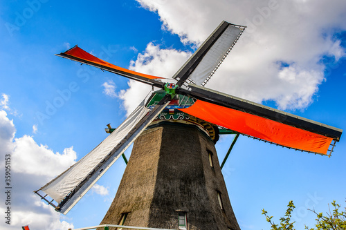 It's Windmill in Zaanse Schans, quiet village in Netherlands, province North Holland