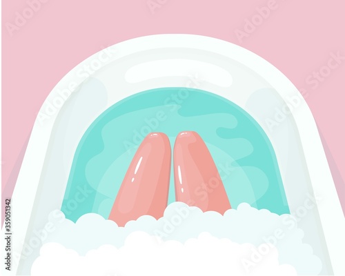 Female legs in the foam bath
