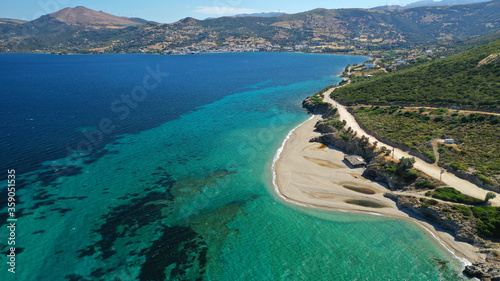 Aerial drone photo of famous big sand emerald sea beach or Megali Amos beach near seaside village of Marmari, South Evia island, Greece photo