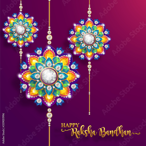Decorated rakhi for Indian festival Raksha Bandhan Greeting Card ,indian festival with gold patterned and crystals on paper color Background.