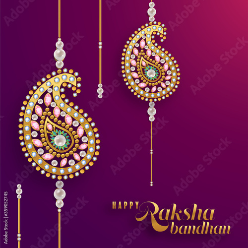 Decorated rakhi for Indian festival Raksha Bandhan Greeting Card ,indian festival with gold patterned and crystals on paper color Background.