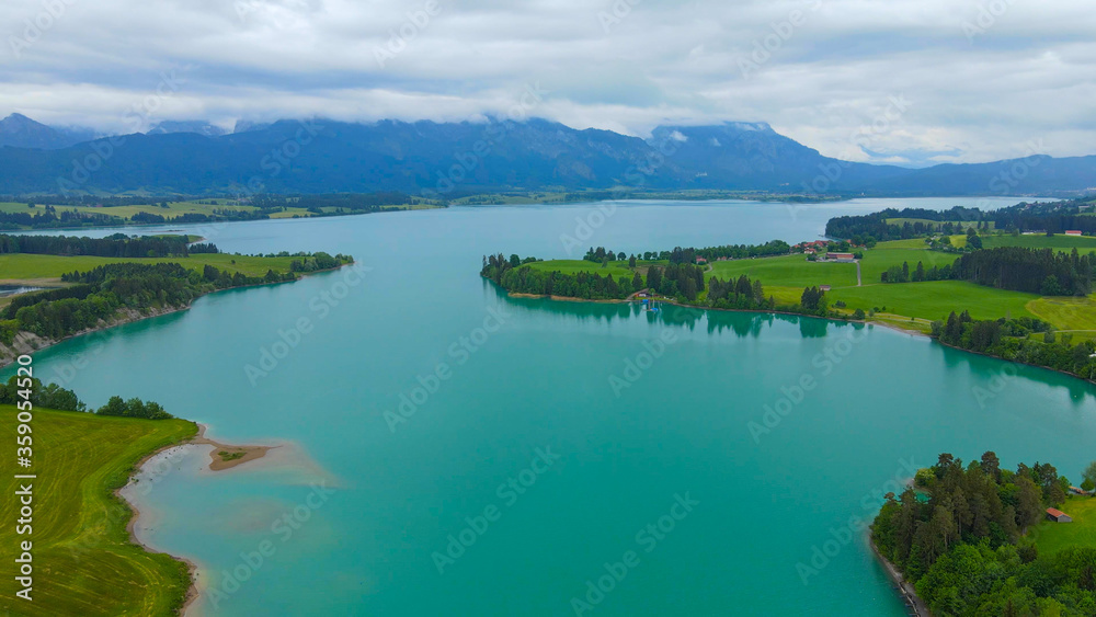 Aerial view over Lake Forggensee at the city of Fuessen in Bavaria Germany Aerial view over Lake Forggensee at the city of Fuessen in Bavaria Germany