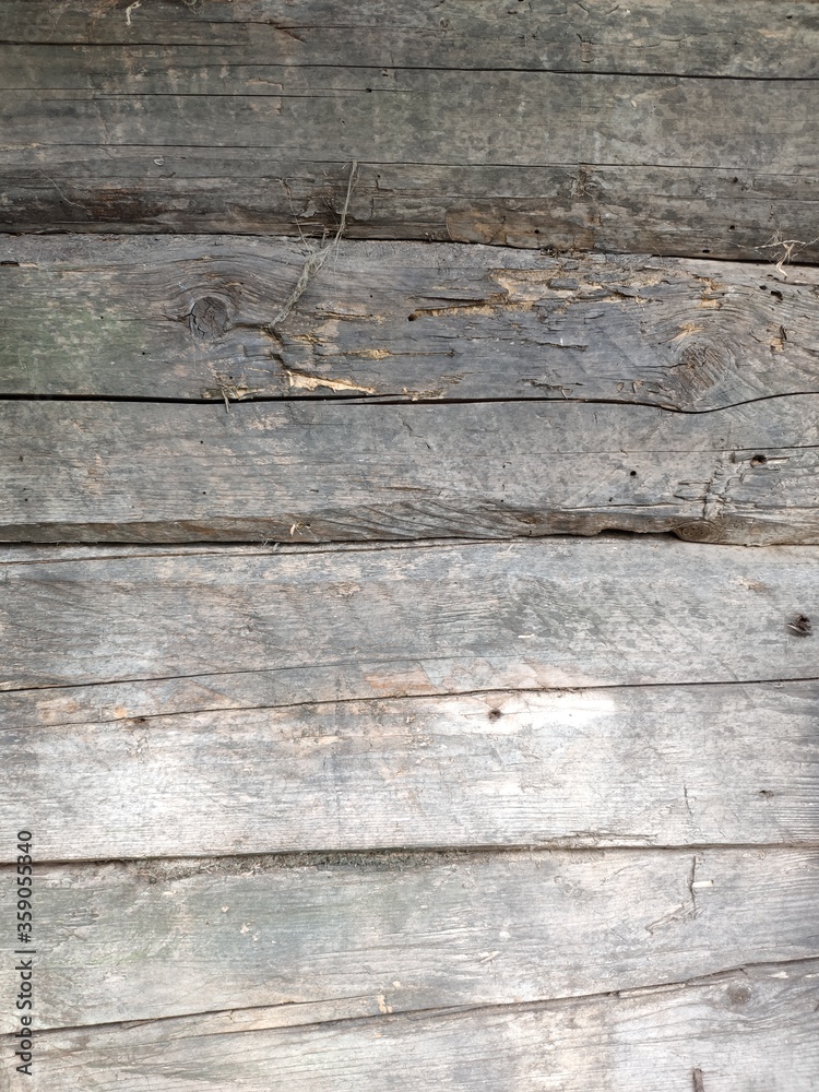 Fence from the boards. The texture of the old boards. Wooden elements of the fence. Fence from the boards. The texture of the old boards. Wooden elements of the fence.
