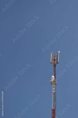 High telephone tower. Beautiful sky with a communications tower in the foreground.Abu dhabi,UAE.16.06.2020.