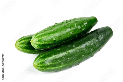 group of a fresh tasty cucumbers isolated on white background.