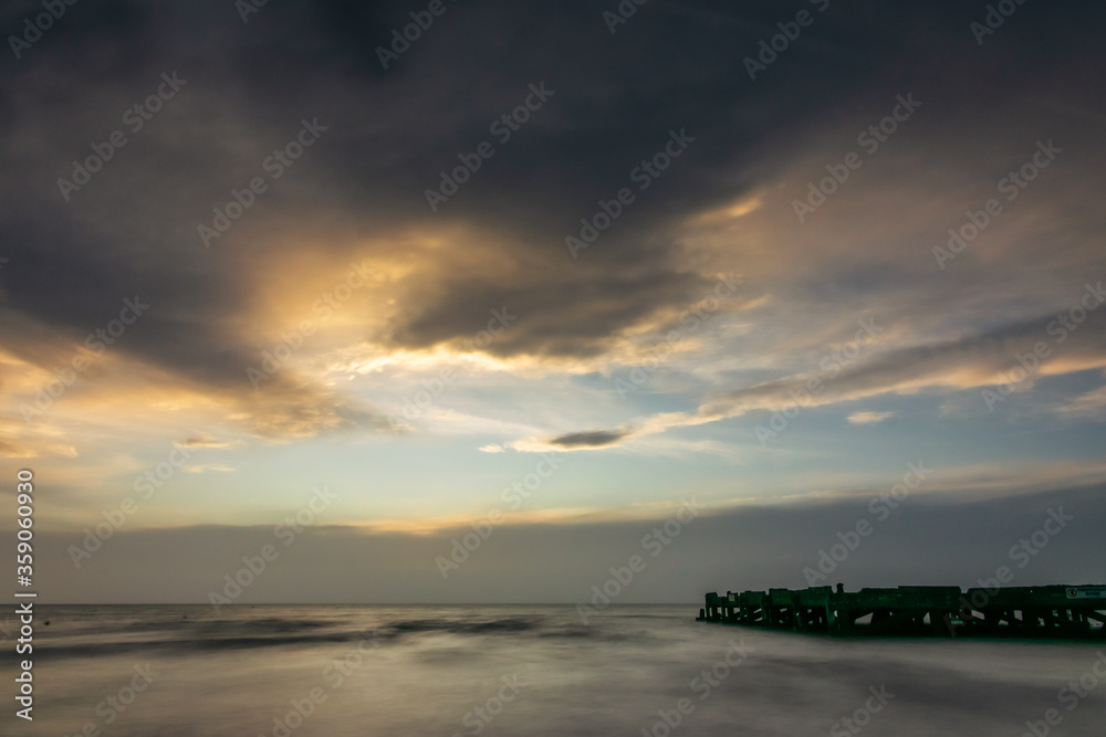 Cloudy sunset over the sea Cloudy sunset over the sea