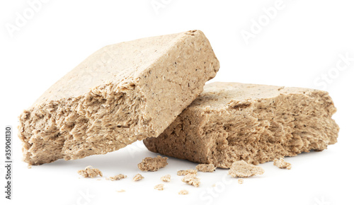 Pieces of halva on a white background. Isolated photo