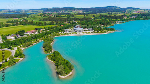 Aerial view over Lake Forggensee at the city of Fuessen in Bavaria Germany © 4kclips