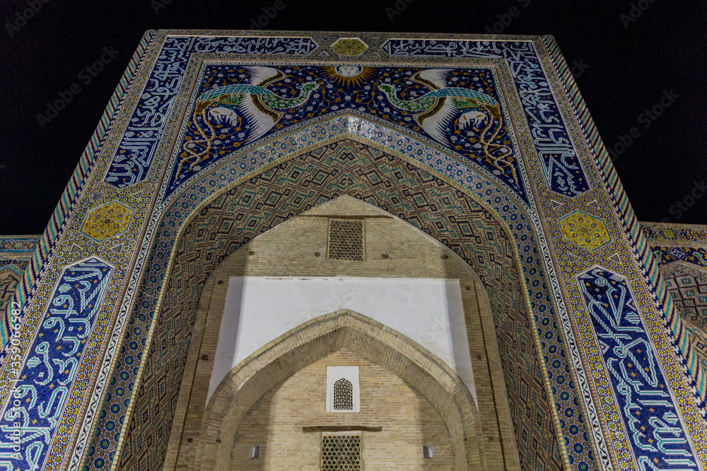 Night view of Nadir Divan-Begi Madrasah in Bukhara, Uzbekistan
