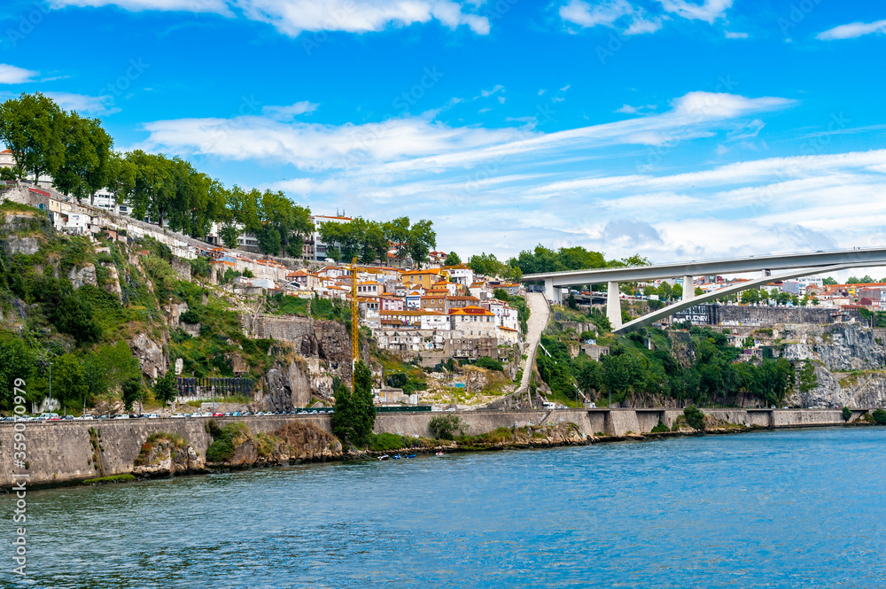It's Architecture over the coast of the River Douro in Porto, Portugal. View from the River Douro, one of the major rivers of the Iberian Peninsula (2157 m)