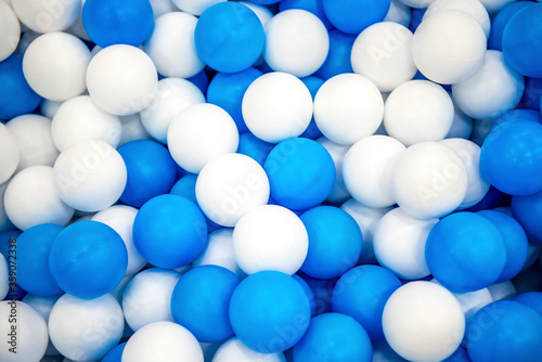 white balls background  room with a lot of white and blue balls 