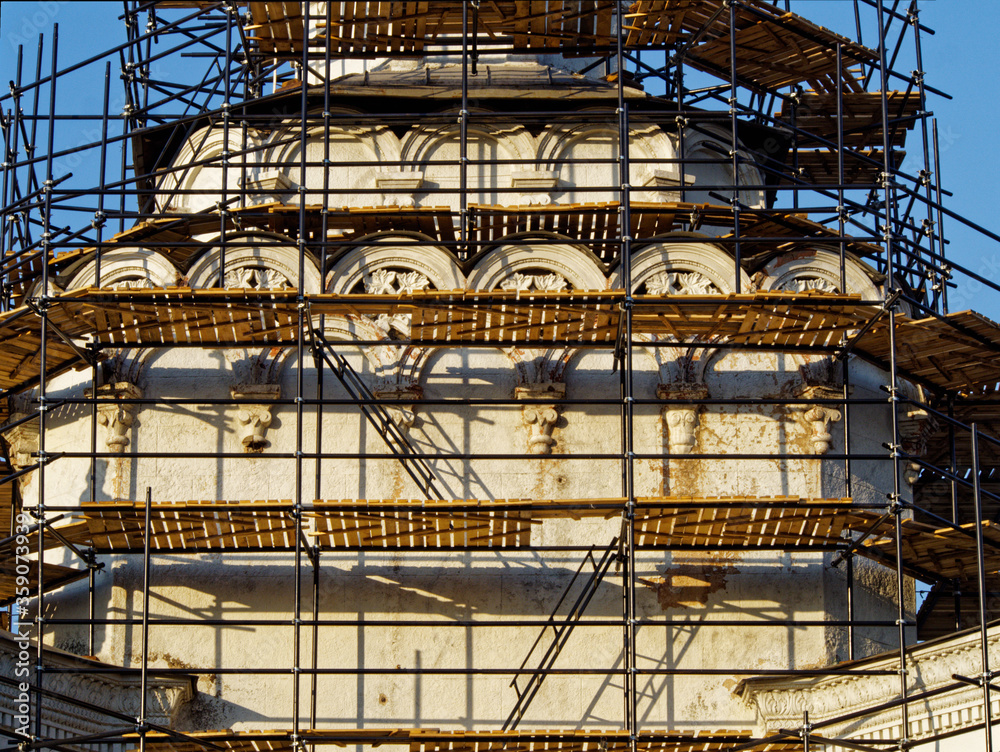 Reconstructed building with decorative elements in scaffolding Reconstructed building with decorative elements in scaffolding