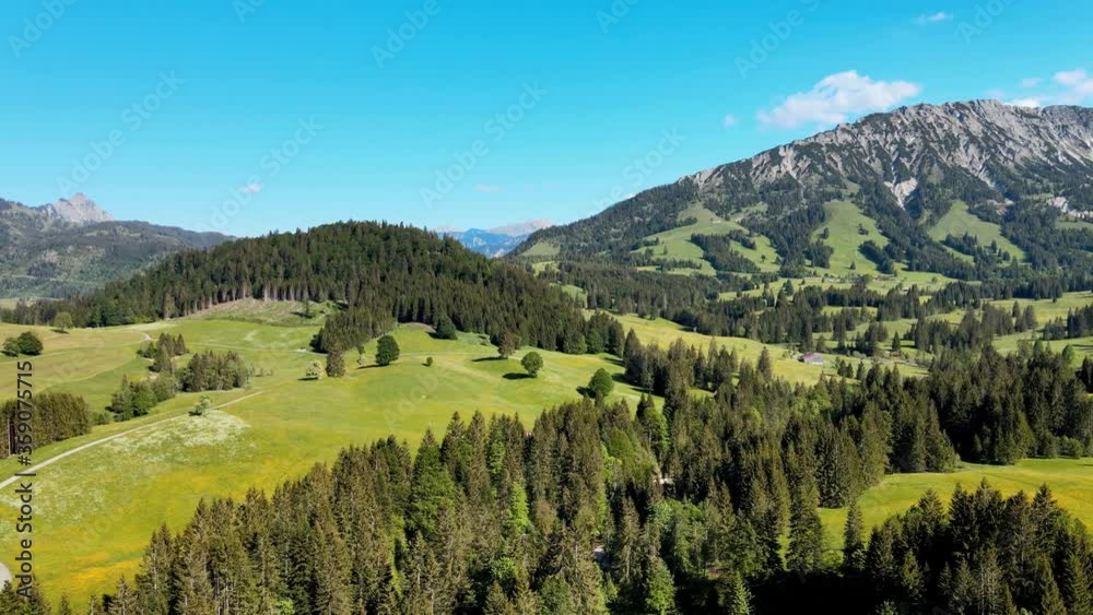 Typical Bavarian landscape in the German Alps - Allgau district - aerial view Typical Bavarian landscape in the German Alps - Allgau district - aerial view